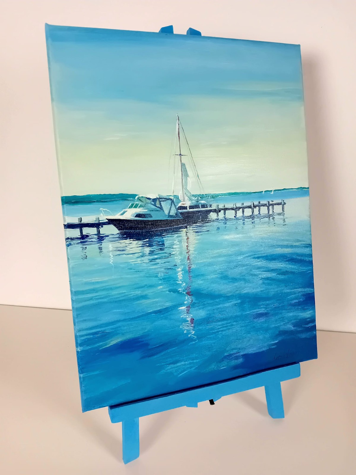 Boote am Steg – Spiegelung im Abendlicht