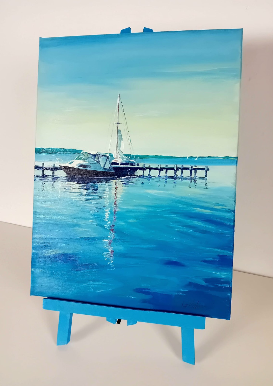 Boote am Steg – Spiegelung im Abendlicht